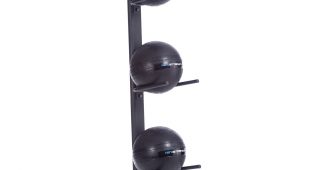 5 black remedy balls on a black vertical rack