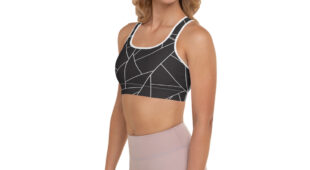 blonde woman, black and white racerback bra with geometric designs, side facing and muted mauve leggings