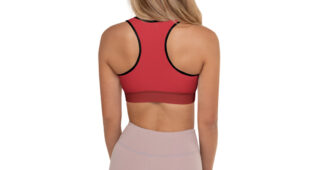 back of blonde woman in red racerback tank with muted mauve leggings