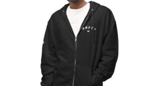 male modeling black hoodie with white hampton logo on the chest