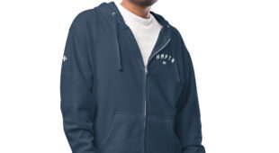 male modeling navy zip up hoodie with white hampton chest logo